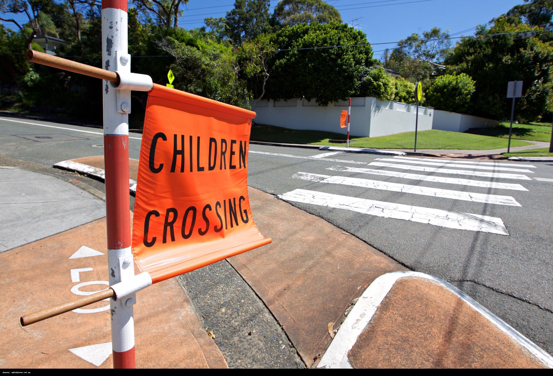 A Friendly Reminder from the School Crossing: Patience Saves Lives!